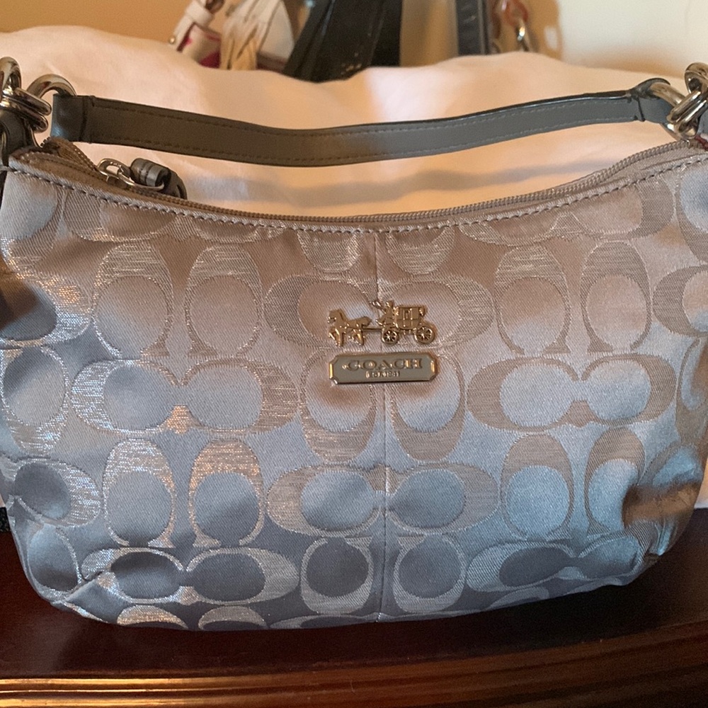 Coach silver small clutch